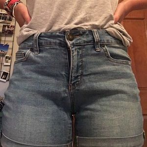Light wash jean shorts.